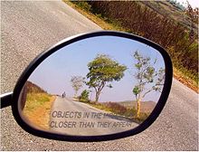 220px-Rear-view-mirror-caption
